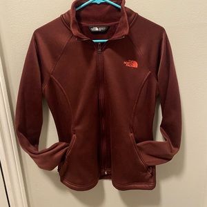 Women’s North Face Maroon Long Sleeve Jacket.